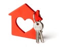 Wooden red house and keys isolated on white background Royalty Free Stock Photo