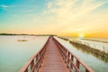 wooden red long bridge with sunset at samut sakhon province,Thailand Royalty Free Stock Photo