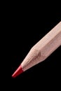 Wooden red Pencil isolated on black background. Macro. Royalty Free Stock Photo