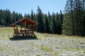 Wooden refuge on a mountain road to  Pietrele Doamnei mountain Lady`s stones cliff. Rarau mountains in Bucovina,  Romania Royalty Free Stock Photo