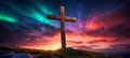 wooden religious cross on the hill with beautiful northern lights and sunset