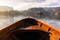 Wooden rent boat on a Bled lake, end of the boat facing towards Lake Bled island with copy space- famous tourist