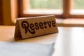Wooden Reserve sign on the table Royalty Free Stock Photo