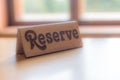 Wooden Reserve sign on the table Royalty Free Stock Photo