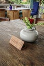Wooden reserved sign on a table