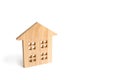 Wooden residential house on a white background. Isolate Real estate concept, buying affordable housing, selling real estate