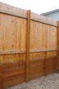 Wooden Retaining Wall with fence above - New Royalty Free Stock Photo