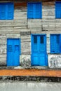 Wooden retro blue door and widows Royalty Free Stock Photo