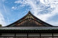 Wooden, richly decorated Nijo Castle roof in Kyoto, with golden ornaments, Japan. Royalty Free Stock Photo