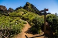 Wooden road sigh pointing Pico Ruivo at the highest walking path of Madeira island. Royalty Free Stock Photo