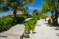 Wooden road to bungalos at the tropical island Royalty Free Stock Photo