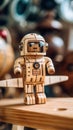 A wooden robot with a knife on a table. Generative AI image.