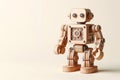 Wooden robot on a light background. Place for text.