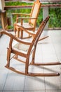 Wooden rocking chair on the terrace of an exotic Royalty Free Stock Photo