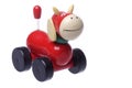 Wooden Rolling Cow Toy Isolated