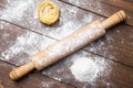 Wooden rolling pin with flour and pasta