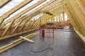 Wooden House Frame. Roof support beams in home under construction Royalty Free Stock Photo