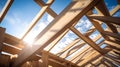 A wooden roof frame rafters on a building under construction, on a sunny day, without people Royalty Free Stock Photo