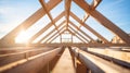 A wooden roof frame rafters on a building under construction, on a sunny day, without people Royalty Free Stock Photo