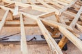 Wooden roof framework of domestic, residential house - under construction details Royalty Free Stock Photo