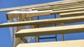 Wooden roof with rafter style framing against a blue sky Royalty Free Stock Photo