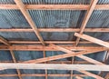 Wooden roof structure withe the zinc plate.