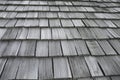 Wooden roofs are lined up for sun and background rain