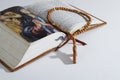 Wooden rosary on a Bible Royalty Free Stock Photo