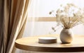 Wooden round beautiful grain podium table flower bouquet in round vase in sunlight from white curtain window on cream concrete Royalty Free Stock Photo