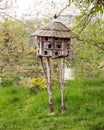 Wooden round birdhouse Royalty Free Stock Photo