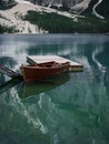 Wooden rowing boat panorama at Lago di Braies Pragser Wildsee alpine mountain lake Dolomites alps South Tyrol Italy Royalty Free Stock Photo