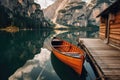 Wooden rowing boat on scenic lake with mountains in background. Generative AI