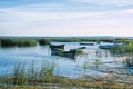 Wooden rowing fishing boats on Lake Drivyaty at sunset. Braslav lakes. Belarus Royalty Free Stock Photo