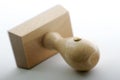 Wooden rubber stamp, isolated Royalty Free Stock Photo