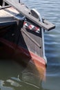 wooden rudder of a flat-bottomed ship at the back of a boat
