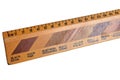 Wooden ruler in centimeters with selective focus showing the different types of wood Royalty Free Stock Photo