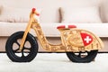 Wooden runbike in the living room at home Royalty Free Stock Photo