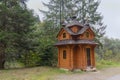 Wooden rural chapel near the road