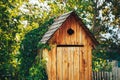 Wooden rural toilet in the bush, public toilet