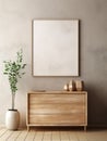 Wooden rustic chest of drawers near wall with blank poster frame with copy space. Interior design of modern living room Royalty Free Stock Photo