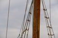 Wooden sailboat on the blue mediterranean sea Details of a classic beautiful sailing yacht with ropes knots and wood plank on deck Royalty Free Stock Photo