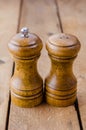 Wooden salt shaker and pepperbox. Royalty Free Stock Photo