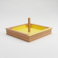 A wooden sandbox with a yellow filling and a vertical stick in the center Royalty Free Stock Photo