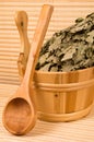 Wooden sauna bucket and spoon Royalty Free Stock Photo