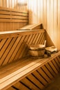 Wooden sauna cabin with sauna accessories Royalty Free Stock Photo