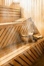 Wooden sauna cabin with sauna accessories Royalty Free Stock Photo