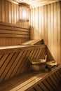 Wooden sauna cabin with sauna accessories Royalty Free Stock Photo