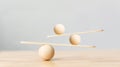 Wooden scale balancing on seesaw Royalty Free Stock Photo