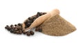 Wooden scoop with black pepper grains Royalty Free Stock Photo