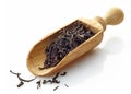 Wooden scoop with black tea Assam Royalty Free Stock Photo